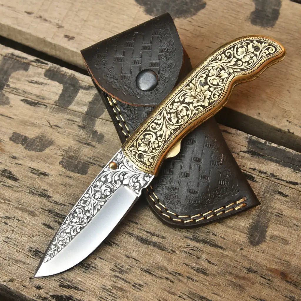 Custom luxury engraved Damascus steel pocket knife open view with gold floral carved brass handle scale and leather pouch EDC USA