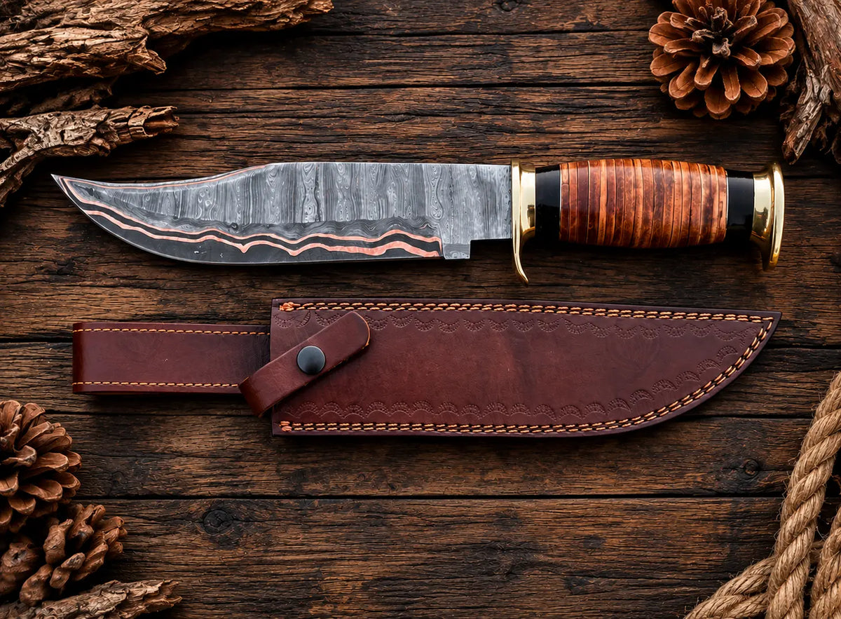 Handmade copper Damascus Bowie knife with leather spacer handle and leather sheath - full view