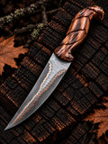 Handmade copper Damascus knife with ladder pattern blade and hand-carved eagle wood handle - full view