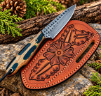 D2 steel drop point blade close-up on camo handle cowboy knife