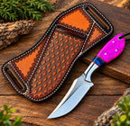 Magenta crackle pattern handle detail with blue resin spacer on cowboy knife