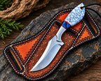 D2 steel drop point blade close-up on marble handle cowboy knife