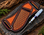 D2 steel cowboy knife on rock background - side angle