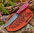 Handmade D2 steel cowboy knife with pink wood handle and tooled leather sheath - full view