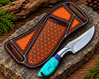 D2 steel drop point blade close-up on turquoise crackle handle cowboy knife