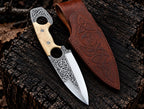 Hand engraved Celtic Viking knotwork on mirror polished D2 steel blade close-up