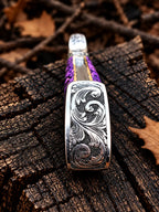 D2 steel hand engraved bear knife on wood background - full length view