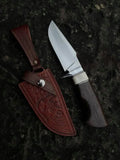 Handmade D2 steel hunting knife with wenge wood handle and hippo design Italian leather sheath - full view