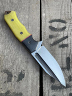 Genuine leather sheath with textured tooling and blue stitching for D2 steel skinner knife