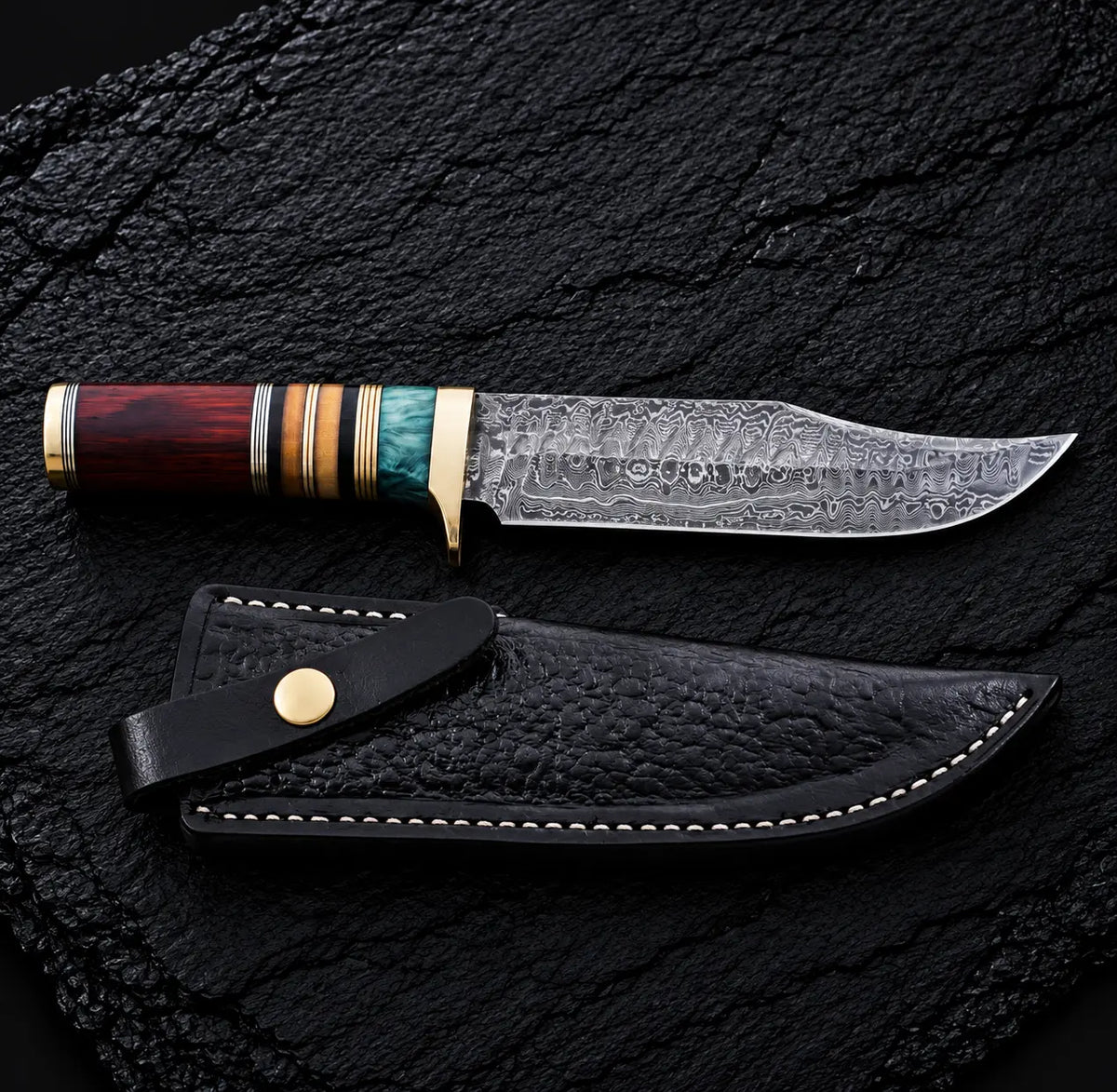 Damascus steel clip point blade pattern close-up on Bowie knife