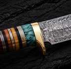 Ironwood olive wood and resin handle detail with brass spacers on Damascus Bowie knife