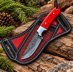 Red crackle stone handle detail with steel bolster on Damascus knife