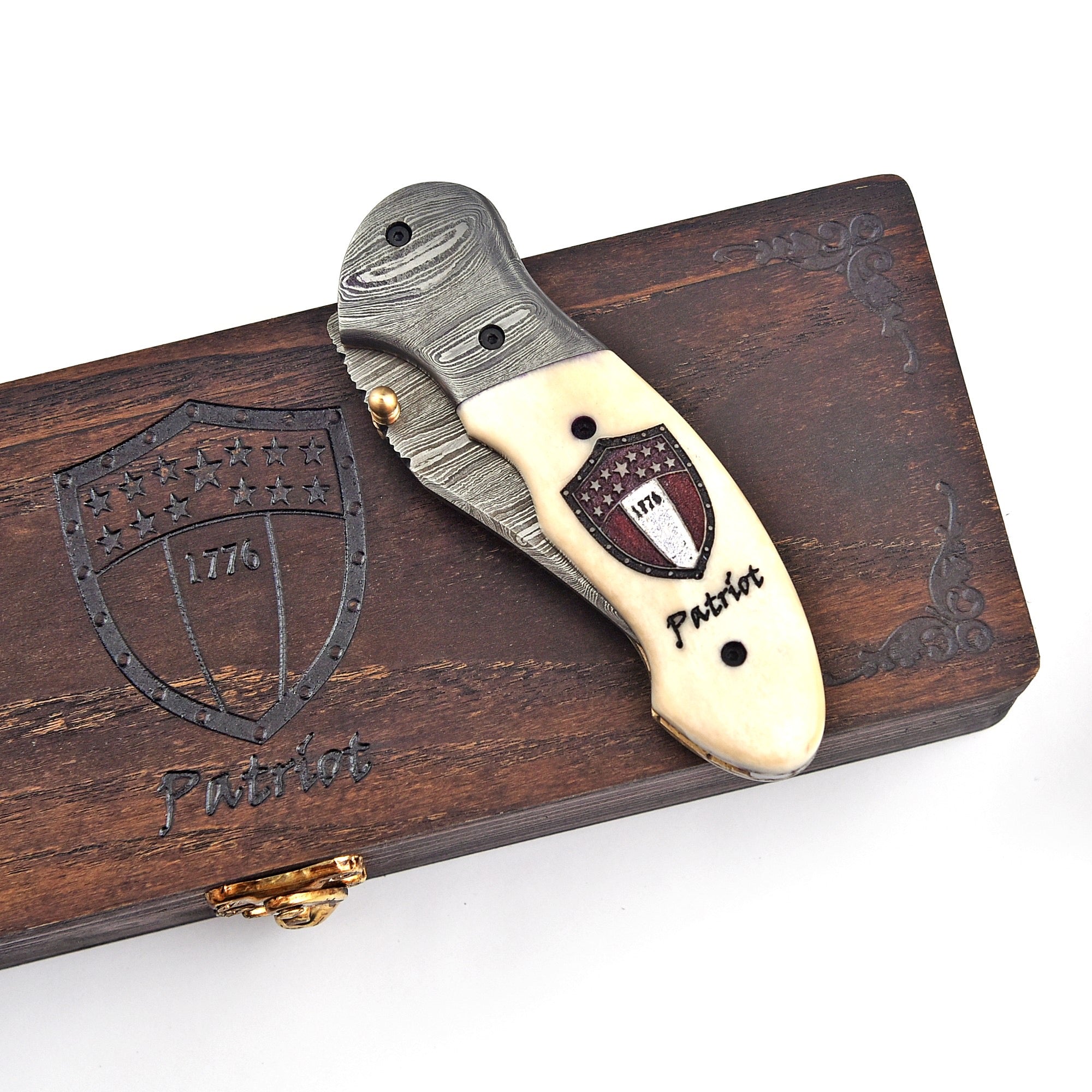 Damascus folding knife handle grip detail