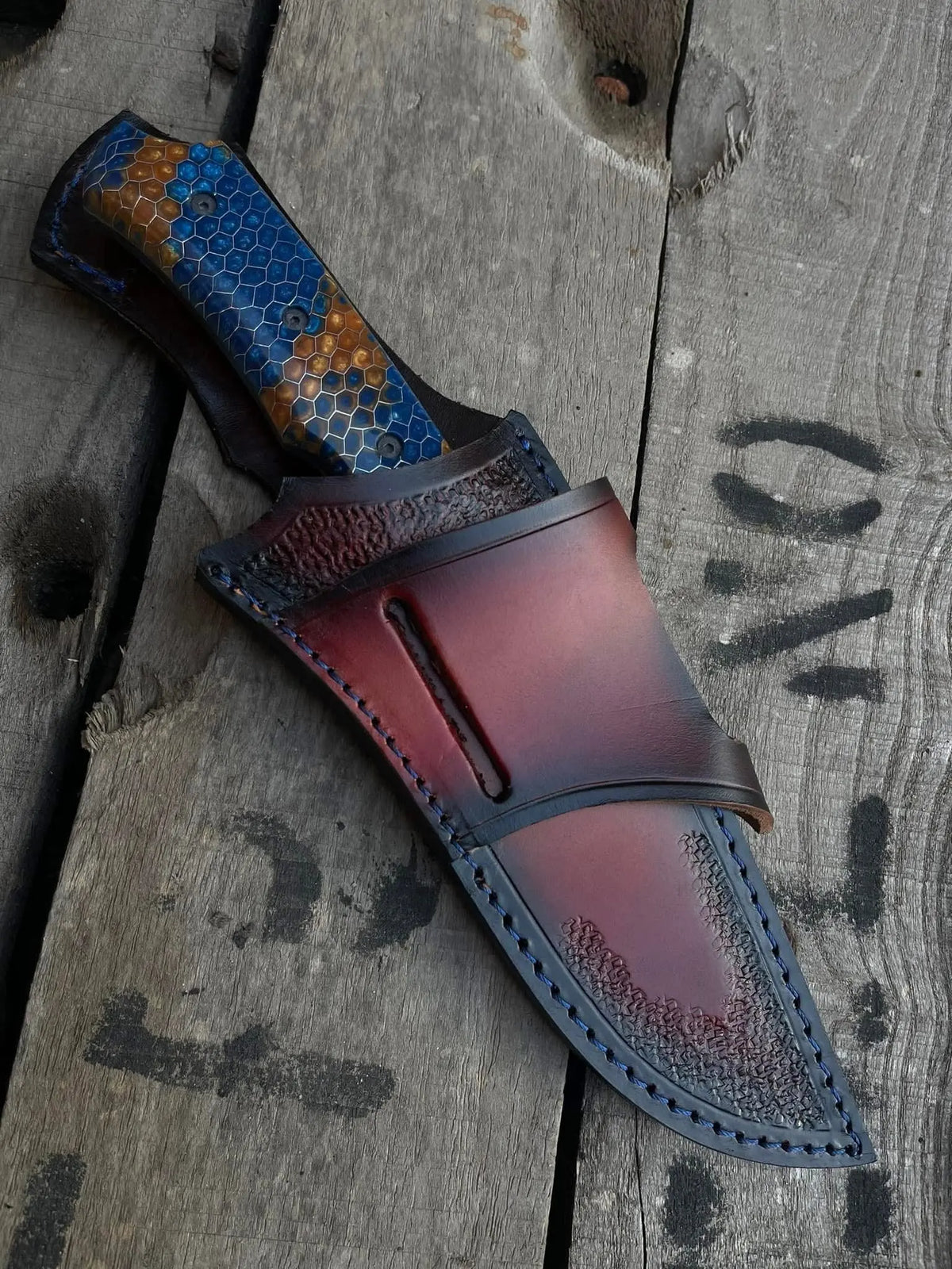 Flowing wave Damascus blade pattern close-up on full tang knife