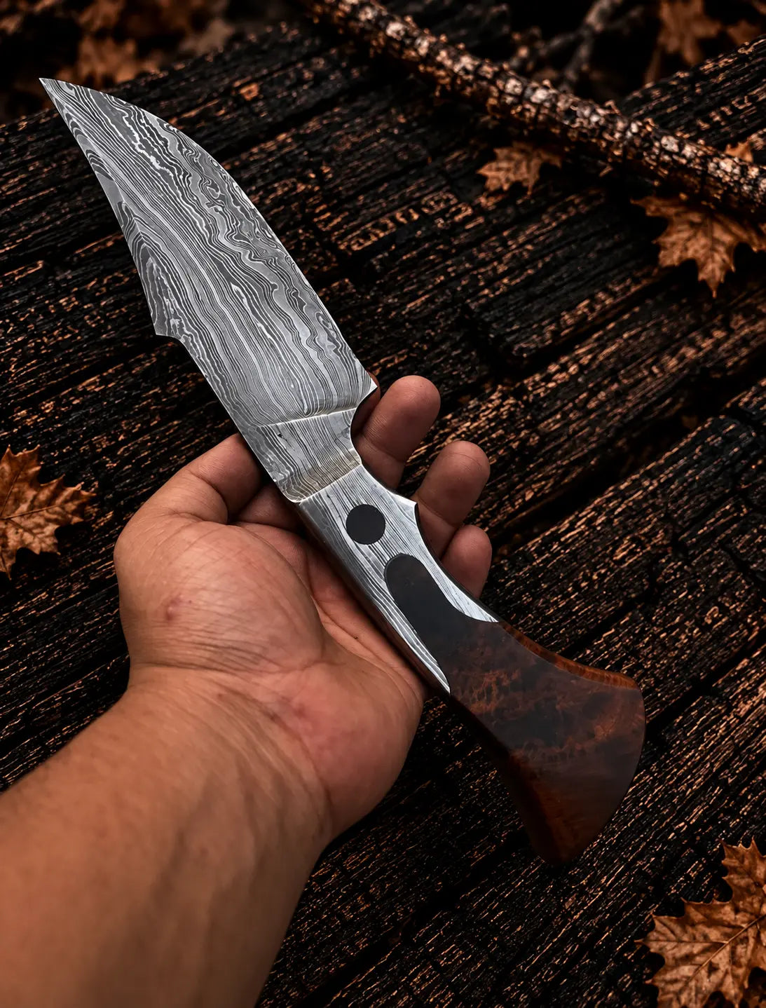 Dark brown leather sheath with orange stitching and croc-embossed panel for Damascus hunting knife