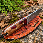 Damascus skinner knife with braided leather lanyard detail