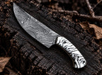 Twist Damascus steel blade pattern close-up on slicer knife