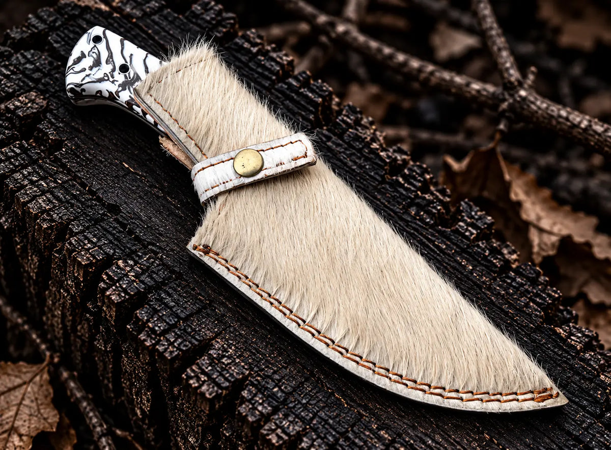 Pinecone resin handle with cow-skin pattern and pins detail
