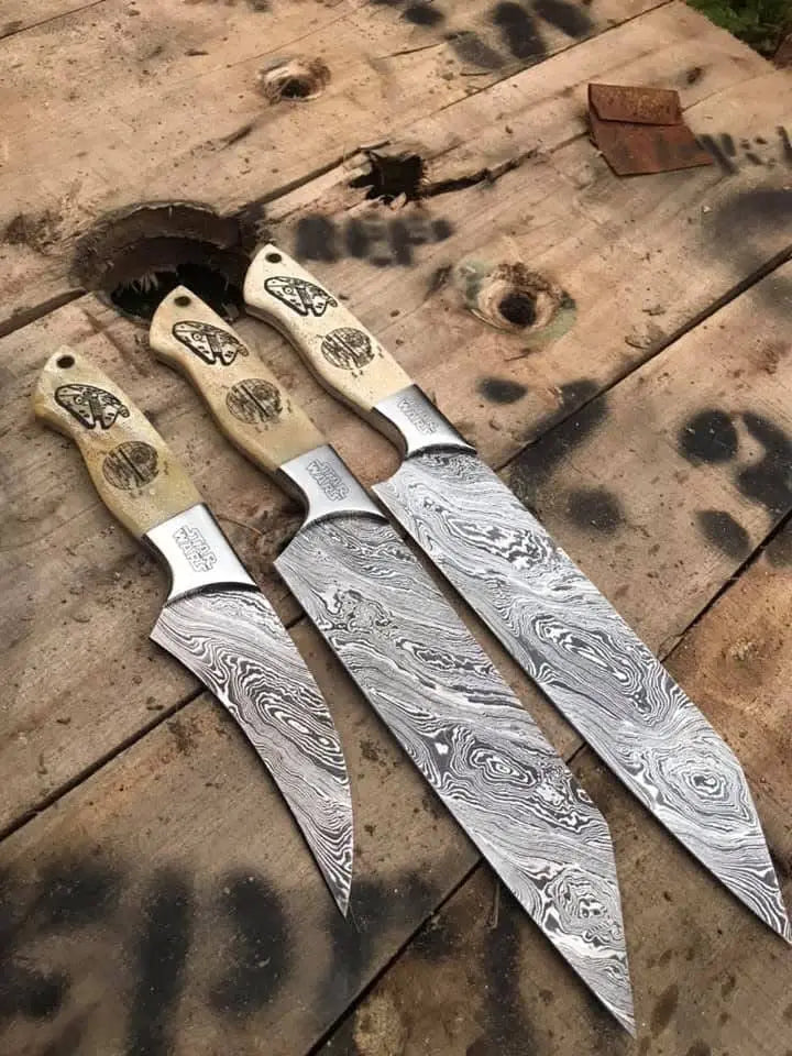 Laser-etched wood handle detail on Damascus steel knife set