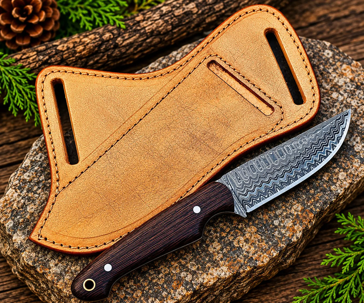 Dark wood handle detail on Damascus steel cowboy knife