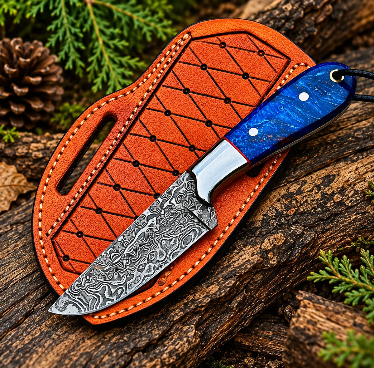 Handmade Damascus steel skinner knife with blue resin handle and raindrop pattern - full view