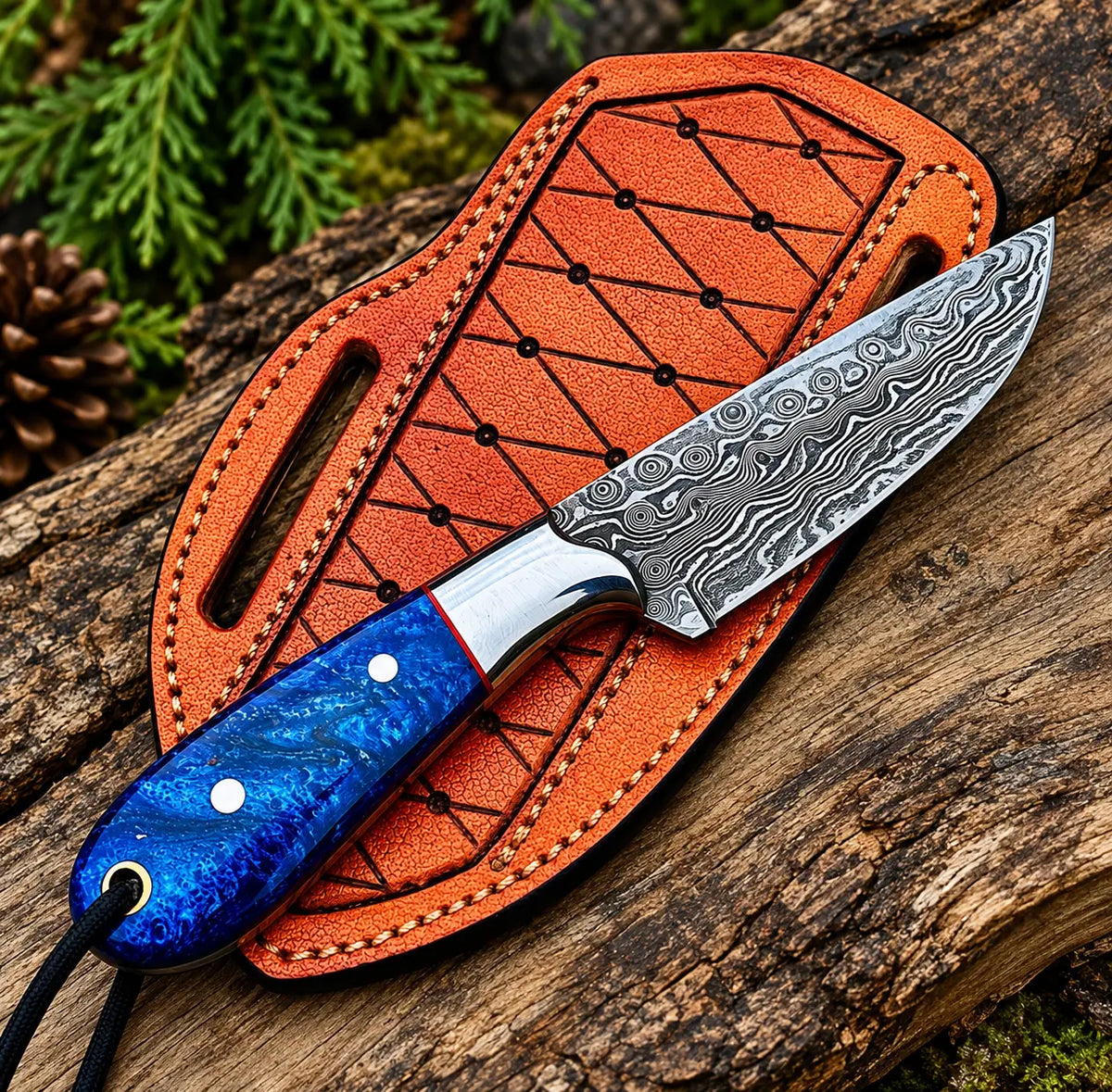 Blue resin handle detail with red liner on Damascus skinner knife