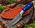 Orange leather sheath with diamond stitching for Damascus skinner knife