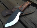Handmade hammered black hunting knife with wood handle and leather sheath - full view