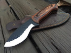 Hammered black hunting knife blade close-up