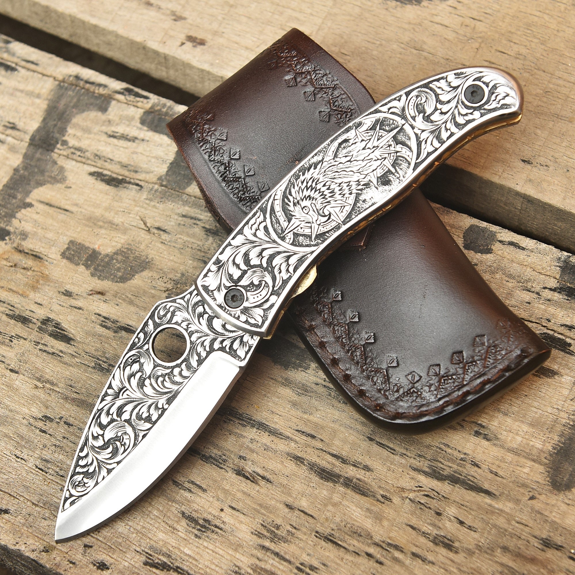 Close-up of hand engraved Damascus knife design