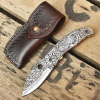 Hand engraved Damascus knife with leather sheath