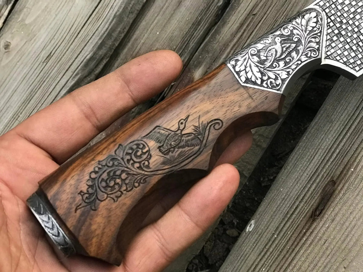 Carved wood handle and engraved silver bolster detail on skinner knife