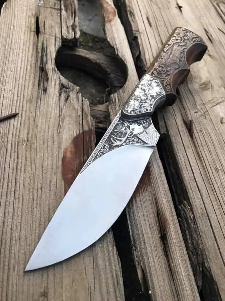 Handmade hand engraved skinner knife with scrollwork ricasso and carved wood handle - full view