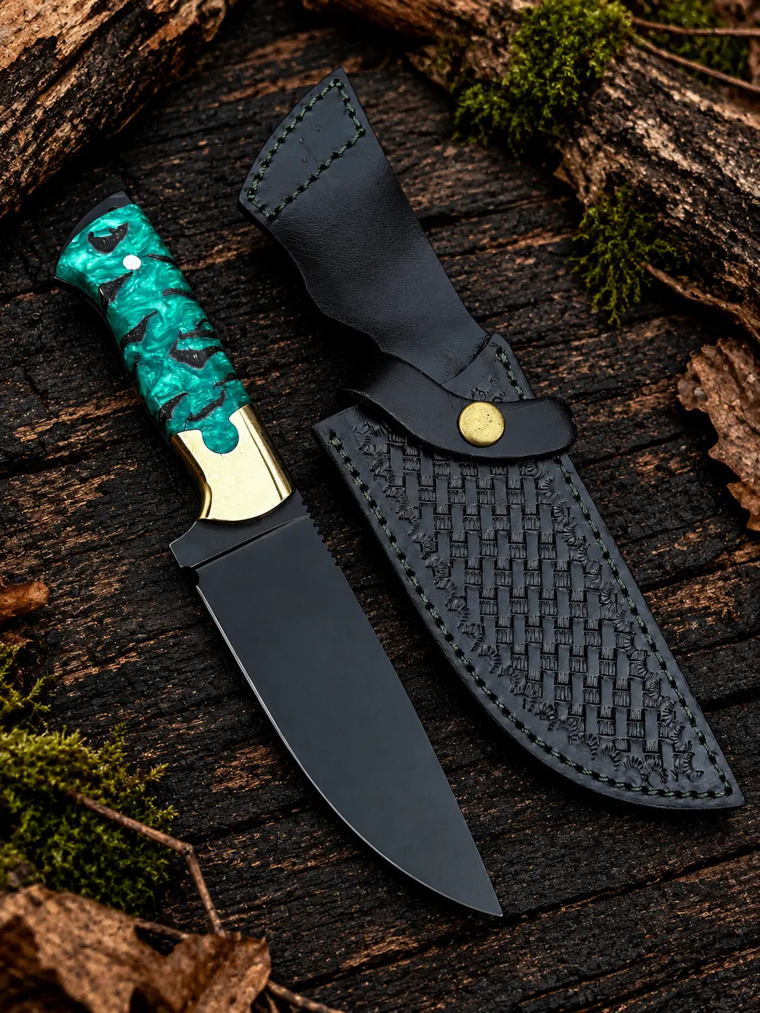 Handmade black powder coated D2 steel skinner knife with green pinecone resin handle, brass bolsters and black Italian leather basket weave sheath