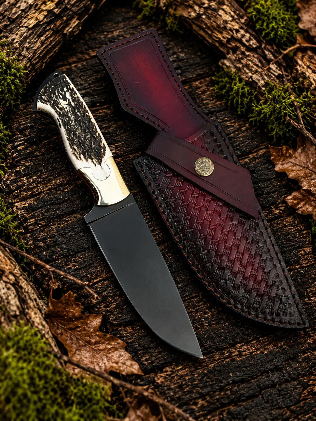 Handmade black powder coated D2 steel skinner knife with stag horn handle, brass bolsters and burgundy basket weave Italian leather sheath