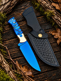 Handmade D2 steel skinner knife with blue anodized blade, blue pinecone handle scales, brass bolsters and black Italian leather basket-weave sheath