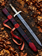 Handmade Damascus skull sword with brass guard, bone grip, brass spacers, skull head pommel and leather wood scabbard with belt