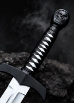 Handmade skull sword with leather scabbard, carbon steel blade and skull pommel - angle 2