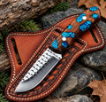 Handmade skinner knife with turquoise stone cluster handle and tooled leather sheath - full view