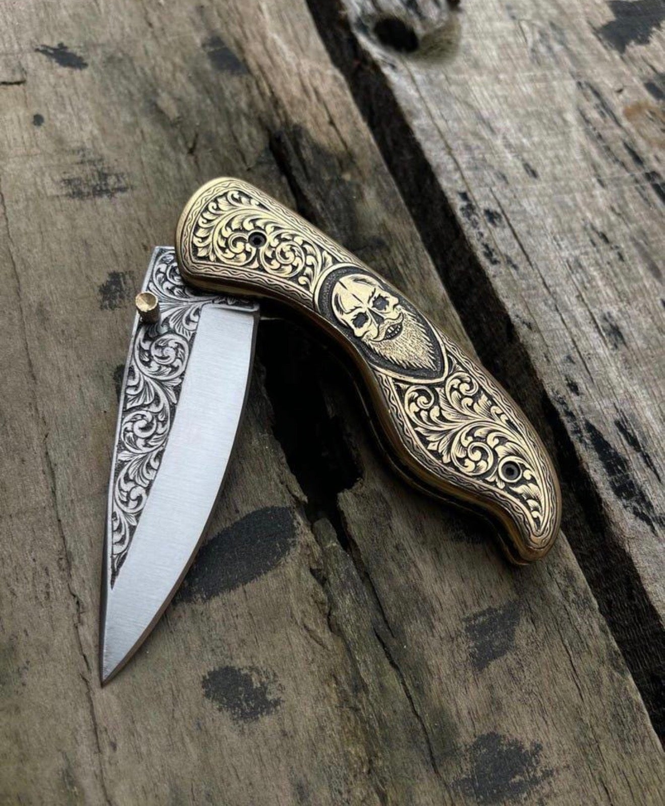 Skull folding knife open, blade detail