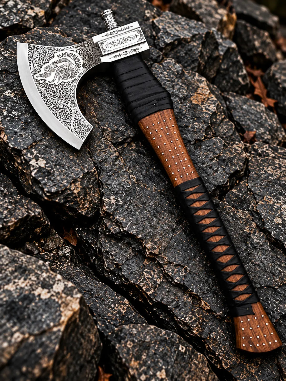 Handmade Viking axe with hand-engraved carbon steel head, wood handle, black leather wrap and brass pins - full view